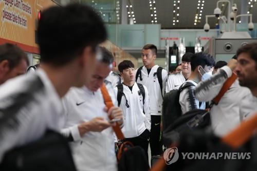 Members of the South Korean men's national football team arrive at Beijing Capital International Airport in China's capital en route to Pyongyang for a World Cup qualifying match against North Korea on Oct. 13, 2019, in this photo provided by the Korea Football Association. (PHOTO NOT FOR SALE) (Yonhap)