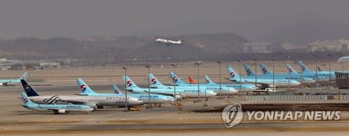 This photo, taken March 17, 2020, shows Korean Air Lines' planes parked at Incheon International Airport, west of Seoul, amid the coronavirus outbreak. (Yonhap) 
