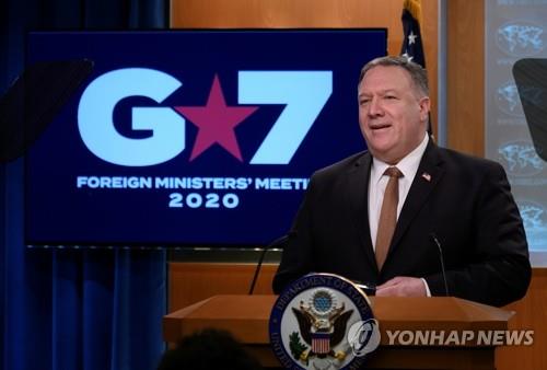 This Reuters photo shows U.S. Secretary of State Mike Pompeo speaking at a news conference in Washington on March 25, 2020, after the teleconference of Group of Seven foreign ministers. (Yonhap)