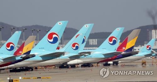 (LEAD) Korean Air's losses widen in Q1 on virus impact, currency losses