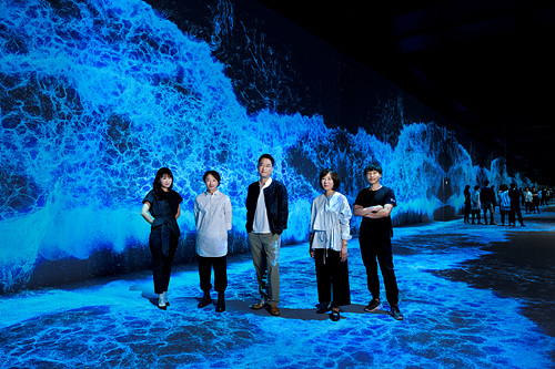 This photo provided by Kukje Gallery shows members of media art unit a'strict standing in front their installation piece "Starry Beach" put on display at the gallery in central Seoul. The solo exhibition by a'strict continues until Sept. 27. (PHOTO NOT FOR SALE) (Yonhap)