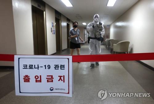 (LEAD) Ruling party, some gov't offices grind to temporary halt due to virus cases