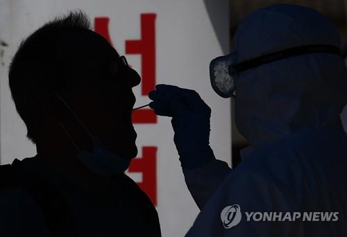 Poll shows anger and fear rising among Koreans after resurgence of coronavirus