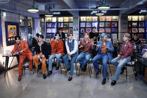 This photo, provided by Big Hit Entertainment on Sept. 21, 2020, shows K-pop group BTS performing on the "Tiny Desk Concert" show on National Public Radio in the United States. (PHOTO NOT FOR SALE) (Yonhap)
