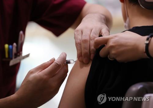 Death toll among flu vaccine recipients approaching 100: agency - 1
