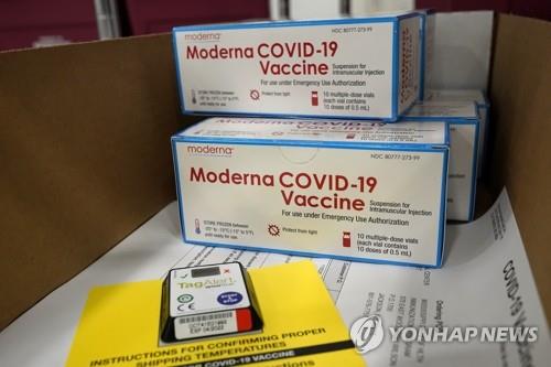 This AP photo shows boxes containing the Moderna COVID-19 vaccine being prepared to be shipped at the McKesson distribution center in Mississippi on Dec. 20, 2020. (Yonhap) 