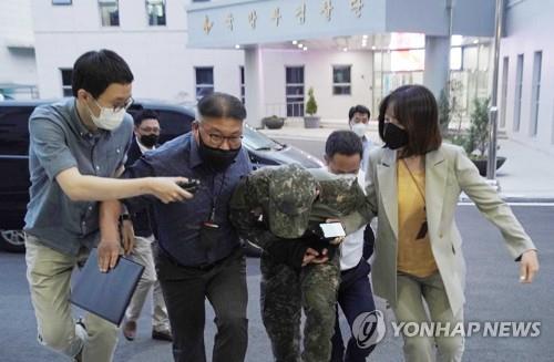 An Air Force officer is taken to a military court in Seoul on June 2, 2021, to attend a hearing to review whether an arrest warrant will be issued over his alleged sexual harassment of a female colleague, which caused her to take her own life in May, in this photo provided by the defense ministry. (PHOTO NOT FOR SALE) (Yonhap)