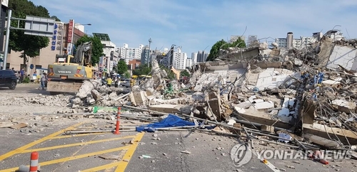 This photo provided by the fire department of Gwangju Metropolitan City shows a building that collapsed during demolition on June 9, 2021. (Yonhap)
