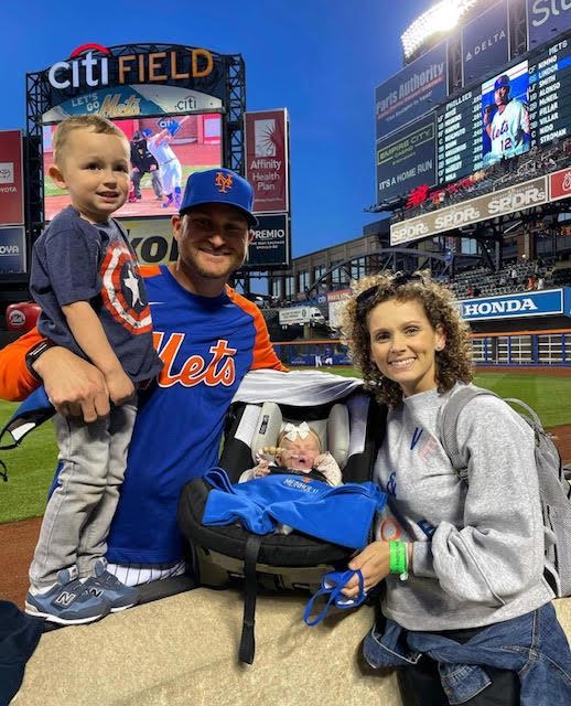 Ricky Meinhold (2nd from L) poses with his family at Citi Field in New York while working as an assistant pitching coach for the New York Mets, in this undated photo provided by Meinhold. (PHOTO NOT FOR SALE) (Yonhap)