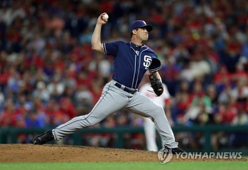 In this Getty Images file photo from July 20, 2018, Robert Stock of the San Diego Padres pitches against the Philadelphia Phillies in the bottom of the eighth inning of a Major League Baseball regular season game at Citizens Bank Park in Philadelphia. (Yonhap)