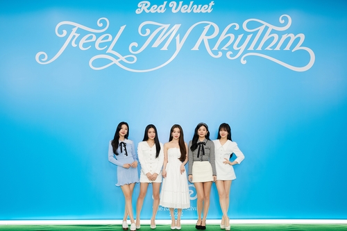 K-pop girl group Red Velvet poses for the camera during an online press conference in Seoul on March 21, 2022, for its new EP "The ReVe Festival 2022 -- Feel My Rhythm" in this photo provided by SM Entertainment. (PHOTO NOT FOR SALE) (Yonhap)