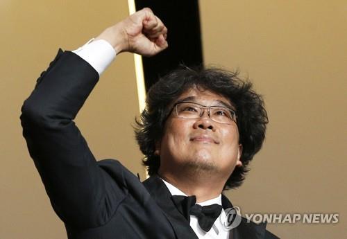 In this Reuters photo, South Korean director Bong Joon-ho reacts after winning the Palme d'Or award for "Parasite" at the closing ceremony of the 72nd Cannes Film Festival in Cannes, southern France, on May 25, 2019. (Yonhap)