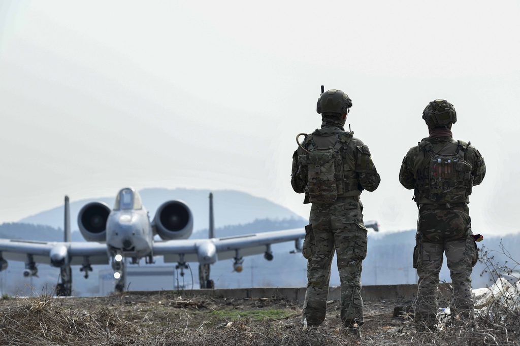 A U.S. Air Force A-10 attack aircraft lands on an emergency runway in the southern county of Changnyeong, 262 kilometers southeast of Seoul, following instructions by the South Korean Air Force's Combat Control Team during joint drills on March 7, 2023, in this photo provided by the South's armed service. (PHOTO NOT FOR SALE) (Yonhap)