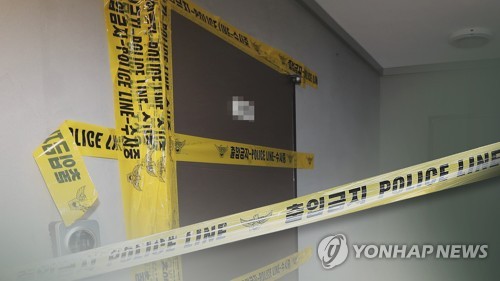 A cordoned-off crime scene is depicted in this composite image provided by Yonhap News TV. (PHOTO NOT FOR SALE) (Yonhap)
