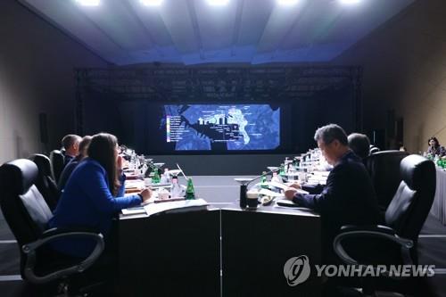 Delegates of the Bureau International des Expositions listen to a presentation on Busan's bid for the 2030 World Expo in Busan, 325 kilometers southeast of Seoul, on April 5, 2023, in this photo provided by the Bid Committee for World Expo 2030 Busan. (PHOTO NOT FOR SALE) (Yonhap)