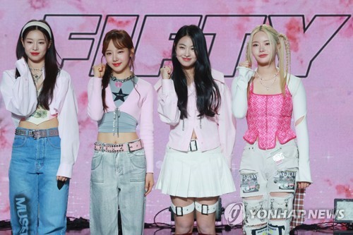 New K-pop girl group Fifty Fifty poses for the camera during a press conference held in Seoul on April 13, 2023. (Yonhap)