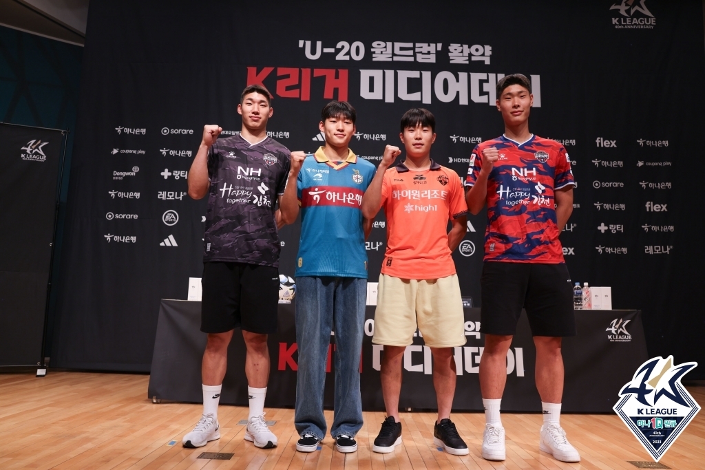 K League players from the South Korean under-20 national football team at the FIFA U-20 World Cup pose for photos before their joint press conference in Seoul on June 21, 2023, in this photo provided by the K League. From left: Kim Joon-hong of Gimcheon Sangmu FC, Bae Jun-ho of Daejeon Hana Citizen FC, Lee Seung-won of Gangwon FC and Lee Young-jun of Gimcheon Sangmu FC. (PHOTO NOT FOR SALE) (Yonhap)