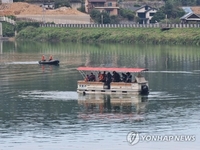 (LEAD) Civilian helicopter carrying 1 pilot crashes into reservoir in Pocheon