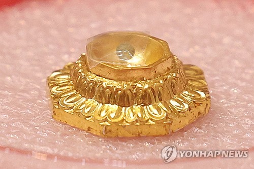 This image shows "sarira" relics of Buddha unveiled to the media at a Buddhist museum in central Seoul on April 19, 2024, following their return after 85 years in the Museum of Fine Arts, Boston. (Yonhap)