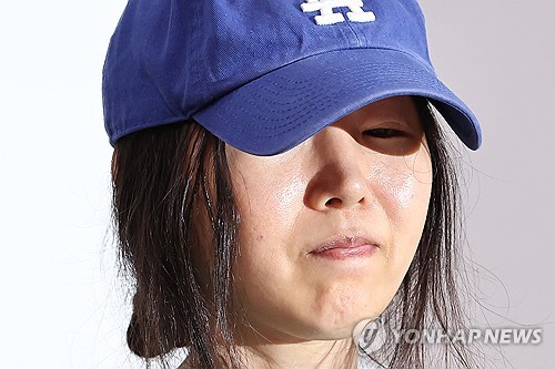 Min Hee-jin, CEO of ADOR, attends a press conference in Seoul on April 25, 2024. (Yonhap)