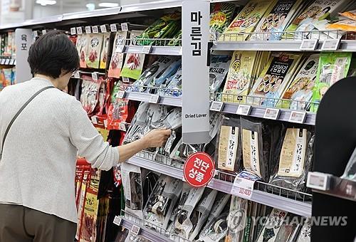 A customer shops at a major discount store in Seoul on May 10, 2024. (Yonhap)