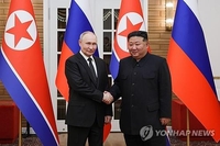 (LEAD) (News Focus) Kim-Putin treaty underlines both deeper security guarantees, shared weaknesses