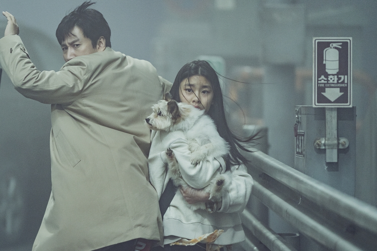 A still cut, provided by CJ ENM on July 11, 2024, shows lead actor Lee Sun-kyun (L) and Kim Su-an from "Project Silence." (PHOTO NOT FOR SALE) (Yonhap)