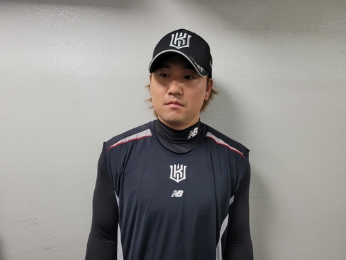 KT Wiz second baseman Kim Sang-su speaks to reporters before Game 2 of the first round in the Korea Baseball Organization postseason at Jamsil Baseball Stadium in Seoul on Oct. 5, 2024. (Yonhap)