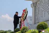 (LEAD) N. Korea's Kim vows not to forget Chinese war dead on armistice anniversary