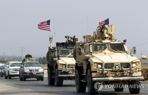 시리아를 떠나 21일 이라크 북부 도후크 주에 도착한 미군 