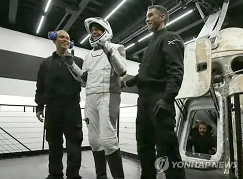 Billionaire Jared Isaacman smiles broadly after returning home safely to Earth