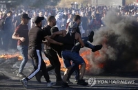 이스라엘군의 팔레스타인 수색중 알자지라 여기자 총격 사망(종합)