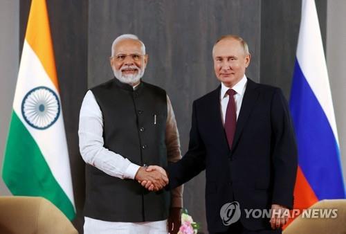 푸틴 "우크라 사태 빨리 끝내고 싶다"…인도 총리와 회담