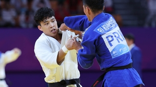 Jeux asiatiques : le judoka sud-coréen An Baul bat le Nord-Coréen Ri Kum-song dans le 1er duel coréen