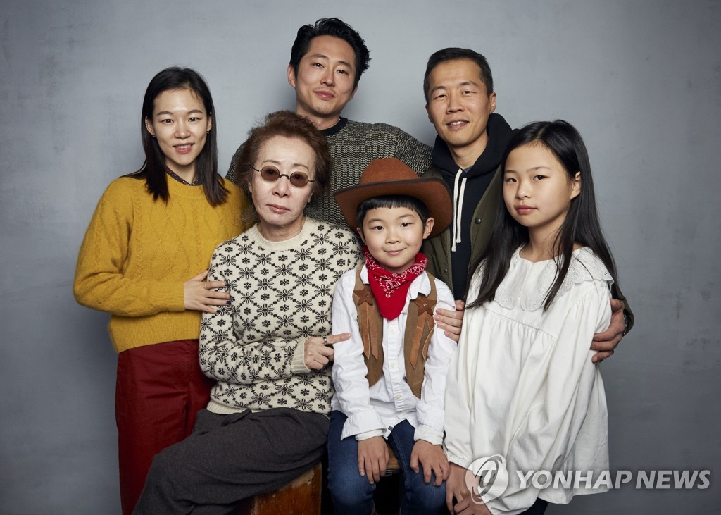 This Associated Press photo from Jan. 27, 2020, shows director Lee Isaac Chung (top right) and cast members of the film "Minari," as they pose for a portrait to promote the drama during the Sundance Film Festival in Park City, Utha. Joining Chung are, clockwise from top left, Han Ye-ri, Steven Yeun, Noel Kate Cho, Alan Kim and Youn Yu-jung. (Yonhap)