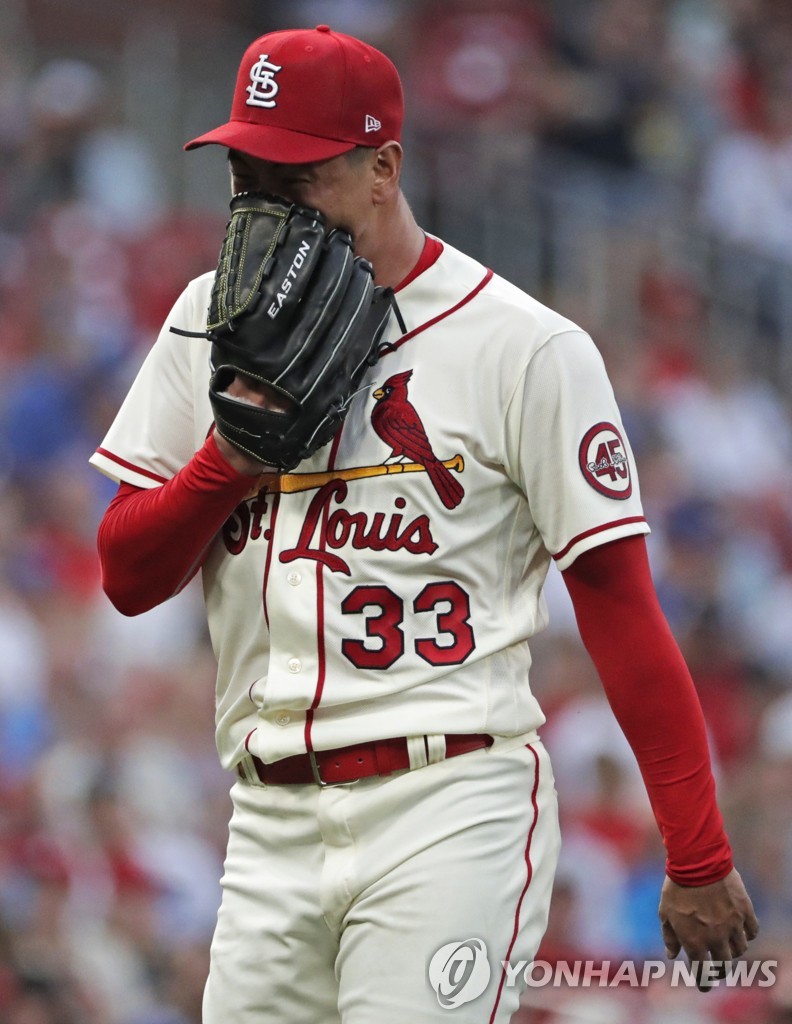 In this Associated Press photo, Kim Kwang-hyun of the St. Louis Cardinals reacts after giving up two runs against the Kansas City Royals in the top of the fourth inning of a Major League Baseball regular season game at Busch Stadium in St. Louis on Aug. 7, 2021. (Yonhap)