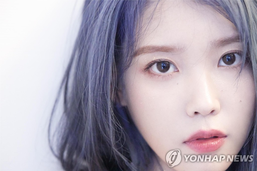 This photo, provided by Kakao M Corp., shows K-pop songstress IU. (PHOTO NOT FOR SALE) (Yonhap) 
