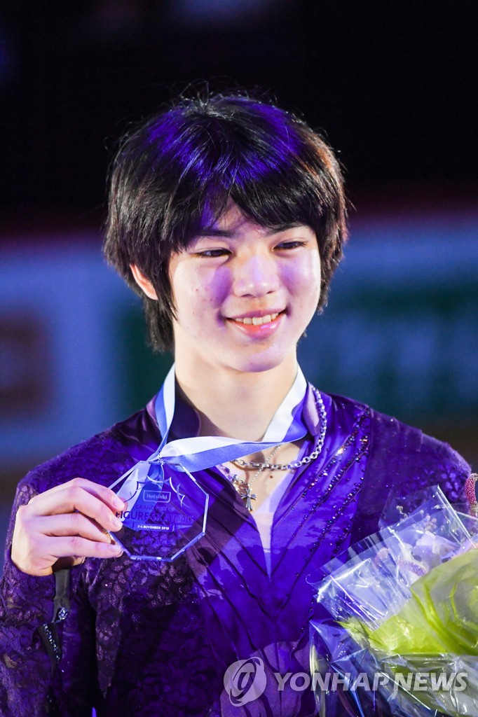 In this EPA file photo from Nov. 4, 2018, Cha Jun-hwan of South Korea celebrates his third-place finish at the International Skating Union Grand Prix of Helsinki at Helsinki Ice Hall in Helsinki. (Yonhap)