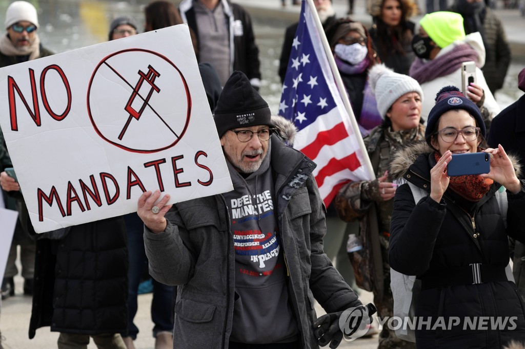 US-PROTESTORS-MARCH-AGAINST-VACCINATION-MANDATES-IN-WASHINGTON,-