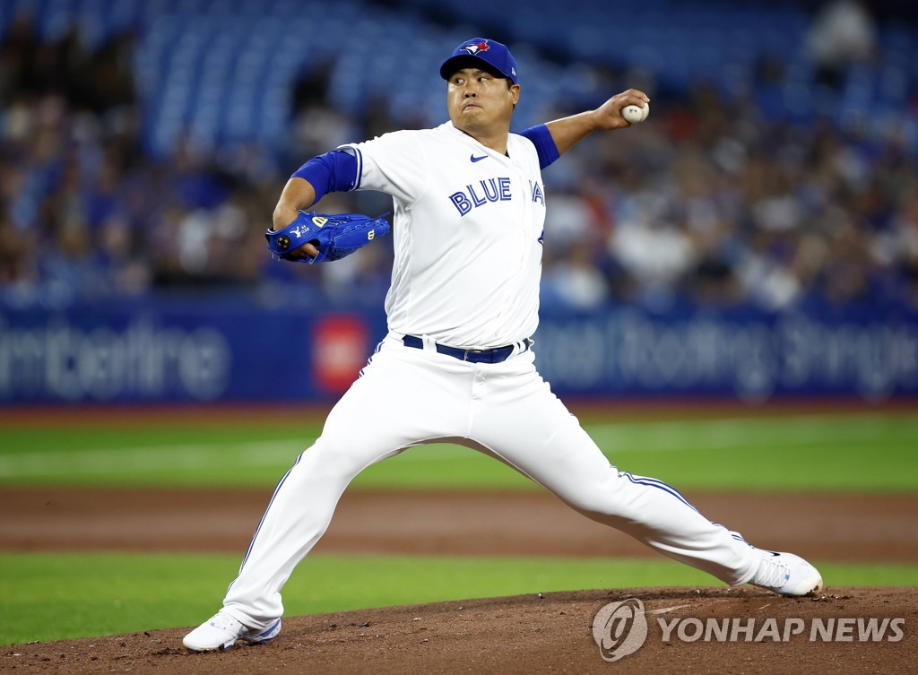 In this Getty Images photo, Ryu Hyun-jin of the Toronto Blue Jays pitches against the Texas Rangers in the top of the first inning of a Major League Baseball regular season game at Rogers Centre in Toronto on April 10, 2022. (Yonhap)