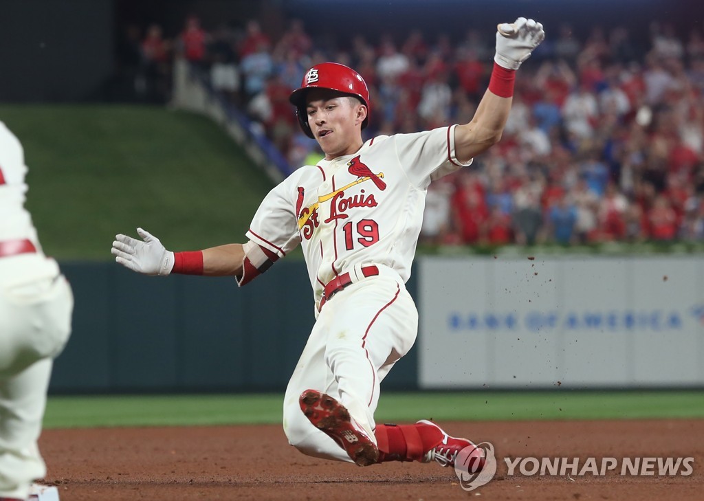 In this UPI file photo from Sept. 28, 2019, Tommy Edman of the St. Louis Cardinals slides into third base for a two-run triple against the Chicago Cubs in the bottom of the fifth inning of a Major League Baseball regular season game at Busch Stadium in St. Louis. (Yonhap)
