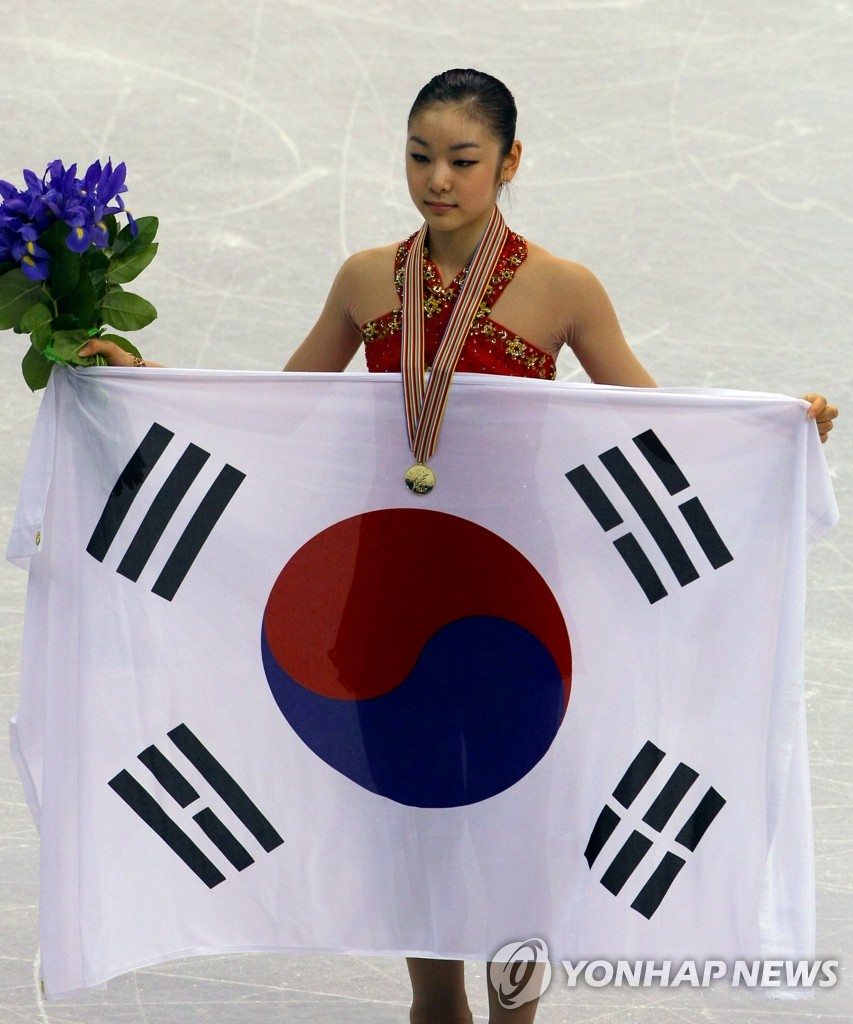 김연아, 200점 돌파..세계선수권 첫 우승