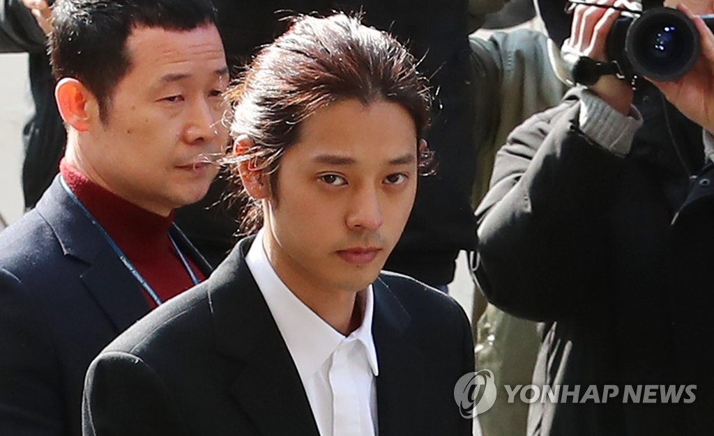 Singer Jung Joon-young shows up at the Seoul Metropolitan Police Agency in central Seoul on March 14, 2019, to undergo questioning over sex video allegations. (Yonhap)