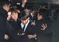 Seungri, Jung Joon-young return home after questioning over sex scandals