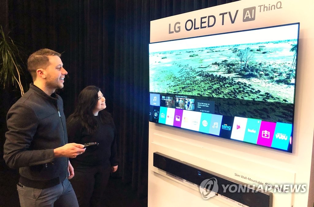 LG Electronics introduces its 2019 OLED TV lineup in a media showcase event held on March 25, 2019 in New York, in this photo provided by the South Korean home appliance maker. (Yonhap) 
