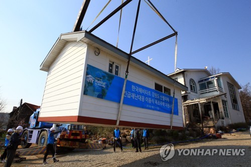 Makeshift houses for fire victims