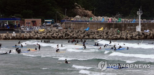 Surfeurs à Yangyang