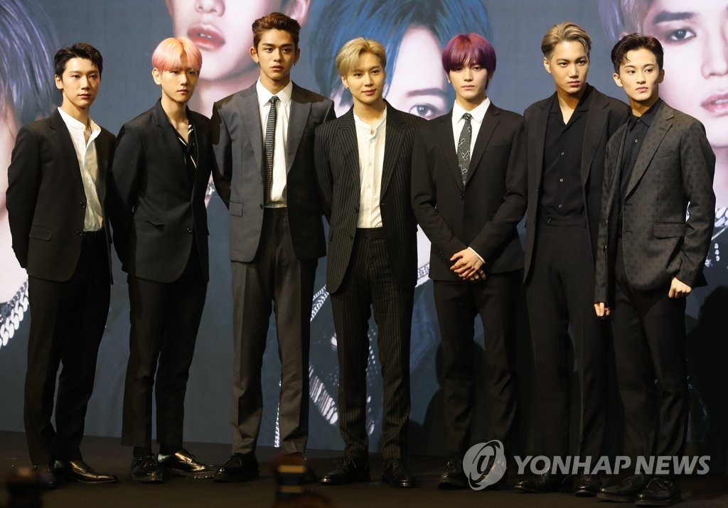 In this file photo, seven-member South Korean boy band SuperM poses for a photo during a showcase for its debut at the Seoul Dragon City hotel in Seoul on Oct. 2, 2019. (Yonhap)