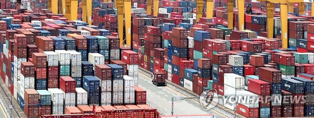 The file photo shows stacks of import-export containers at South Korea's largest seaport in Busan, 450 kilometers south of Seoul. The Korea Customs Services said on April 13, 2020, that South Korea's exports plunged 18.6 percent on-year in the first 10 days of April, an apparent outcome of the new coronavirus pandemic. (Yonhap)