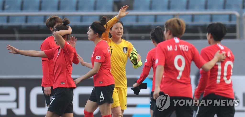 In this file photo from Feb. 9, 2020, South Korean players celebrate their 3-0 victory over Vietnam in their Group A match in the third round of the Asian qualifying for the 2020 Tokyo Olympics at Jeju World Cup Stadium in Seogwipo, Jeju Island. (Yonhap)